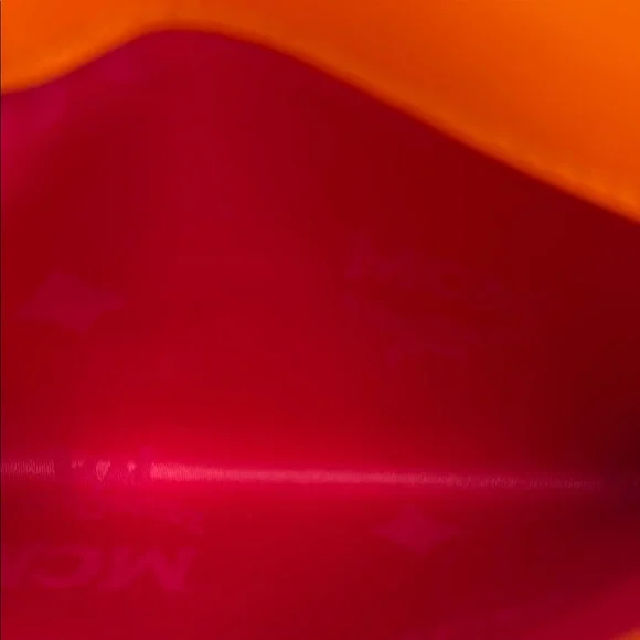 MCM Vibrant Orange Leather Clutch